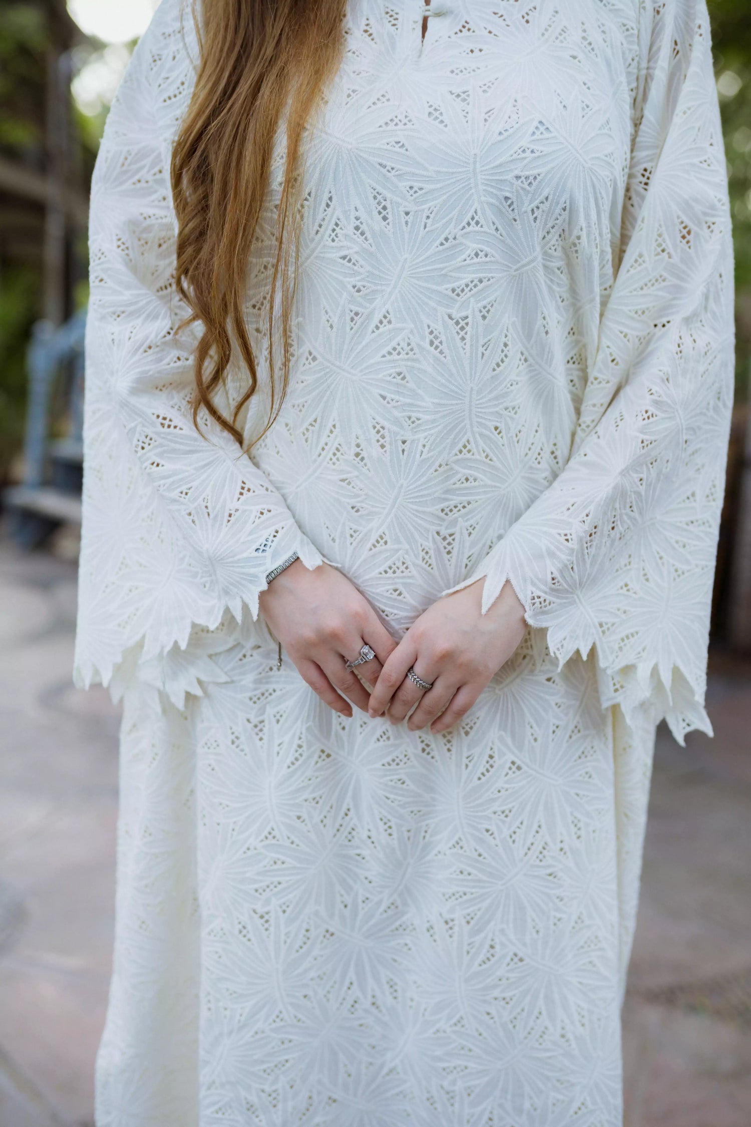 White kaftan kurta with leaf Shiffli embroidery and flared sleeves

