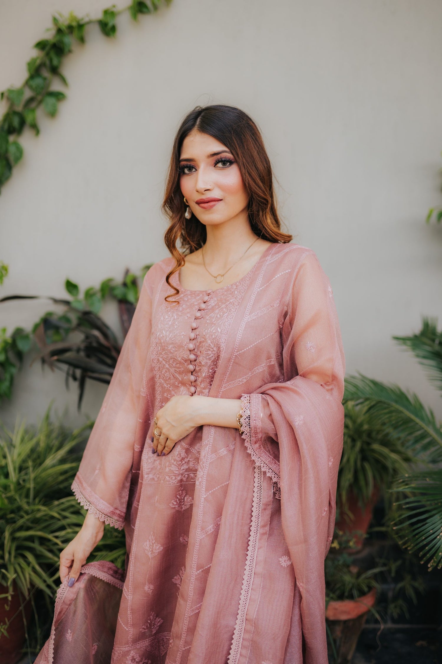 AU-01 – Tea Pink Khaddi Cotton Net Embroidered 3PC Suit