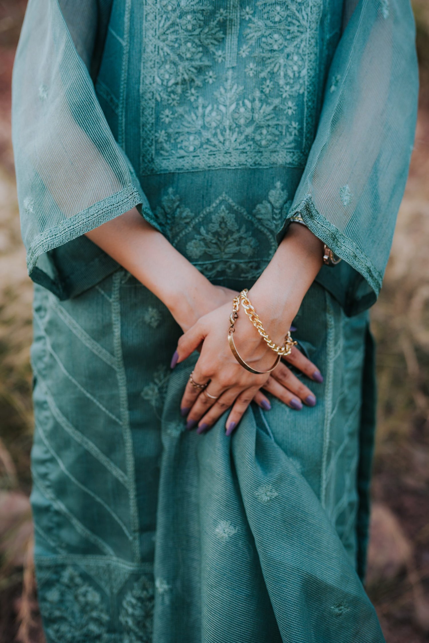 AU-05 – Mint Green Embroidered Khaddi Cotton Net 3PC Suit